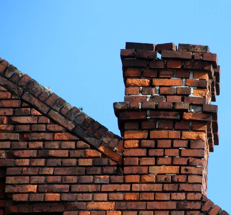 Signs Your Roseville Home Needs a Chimney Inspection Damaged chimney on an Roseville home showing cracks and missing mortar